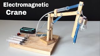 How to Make Hydraulic Powered Crane with Electromagnet at Home [upl. by Neesay451]