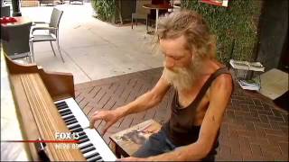 Homeless piano man attracts attention in Florida [upl. by Cristoforo216]