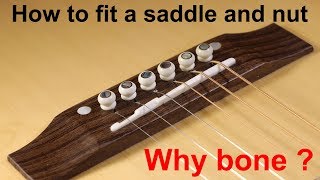 How to fit a bone saddle and nut Why fit a bone saddle and nut on an acoustic guitar [upl. by Zerline]