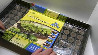 How to Use a Jiffy Greenhouse to Start Seeds [upl. by Georgi]