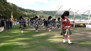 Massed Pipes amp Drums return march after the 2018 Ballater Highland Games in Deeside Scotland [upl. by Jory]