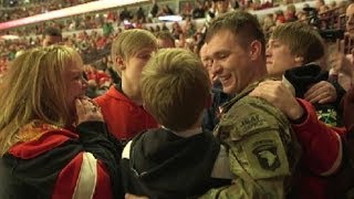 Soldier Surprises Family for Christmas at Blackhawks Game [upl. by Leidba]