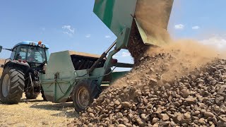 Pickingup ROCKS from the Field  Rock Picker on Tractor [upl. by Beatrix]